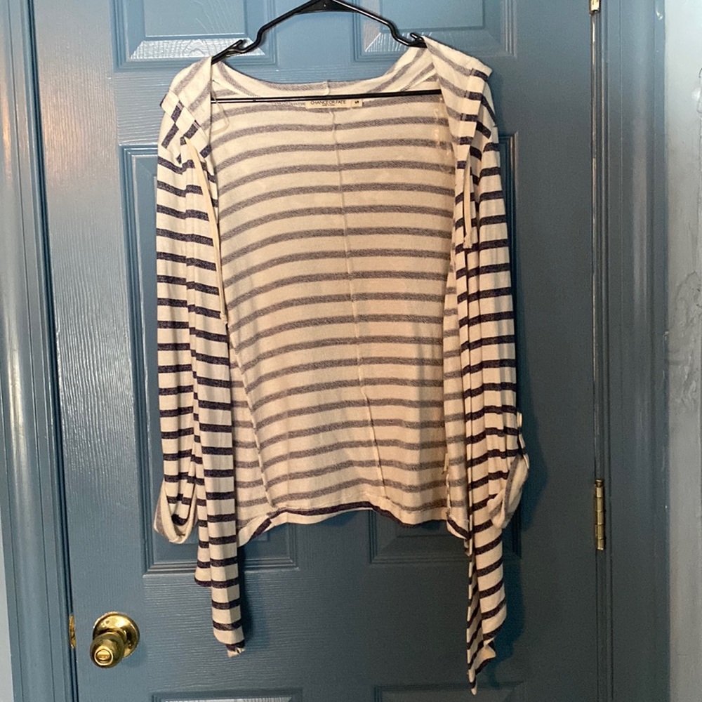 Open front, light terry cloth, hooded jacket. White with dark blue stripes.